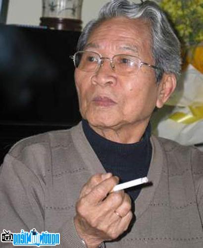A portrait image of Director Nguyen Dinh Quang