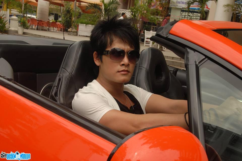  Singer Thien Truong with a supercar