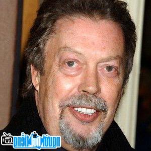 A portrait picture of Actor Tim Curry