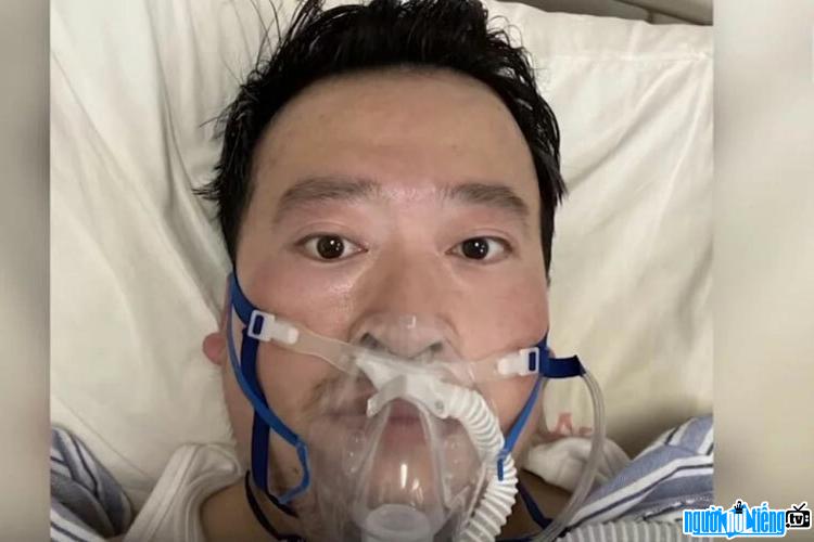  Picture of Doctor Ly Van Luong on a hospital bed