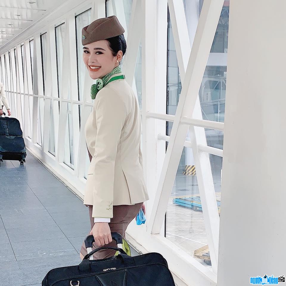  the beautiful Nguyen Tram Anh in the flight attendant uniform