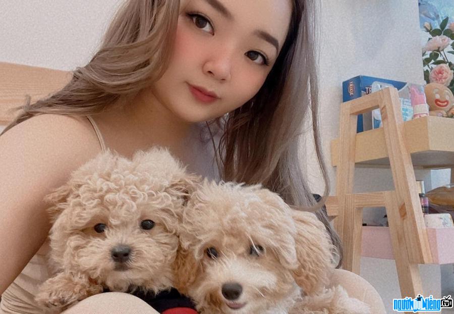  beautiful Truong Ngoc Bao Vy with a dog Babe