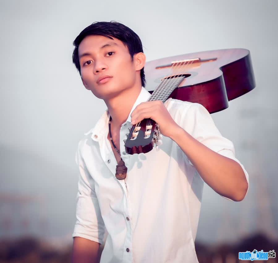 handsome Phuong Nguyen with a guitar
