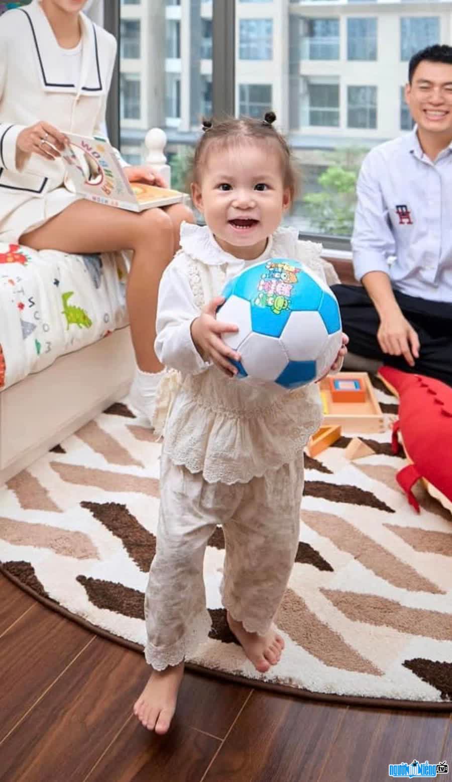 Image of baby Pam Yeu Oi smiling brightly