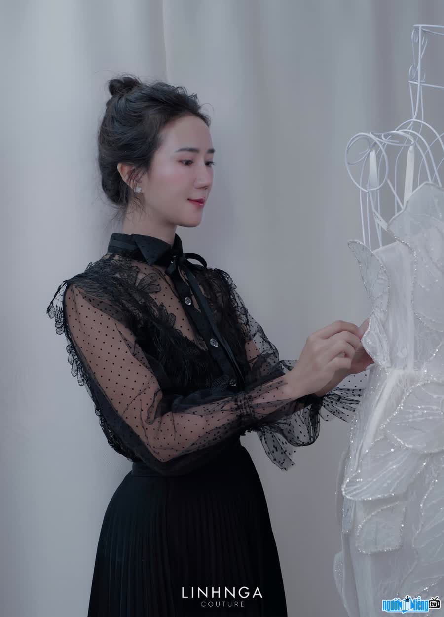 Image of designer Linh Nga being passionate about her work