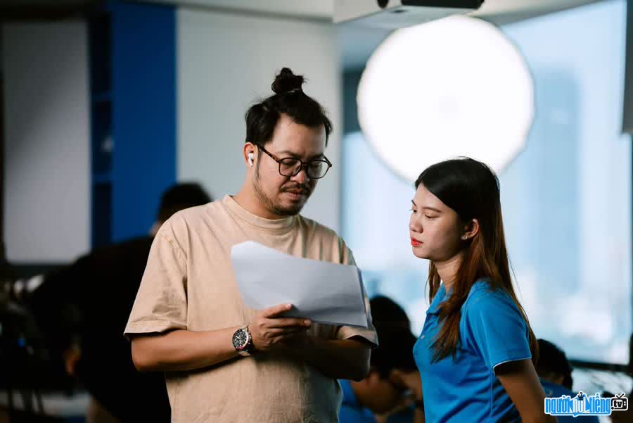 Image of director Lai Huy Hoang enthusiastically at work