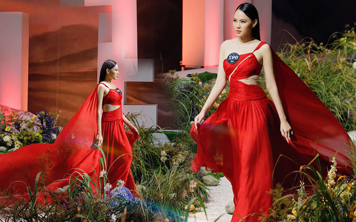 Image of beauty Huong Ngo confidently striding on the catwalk