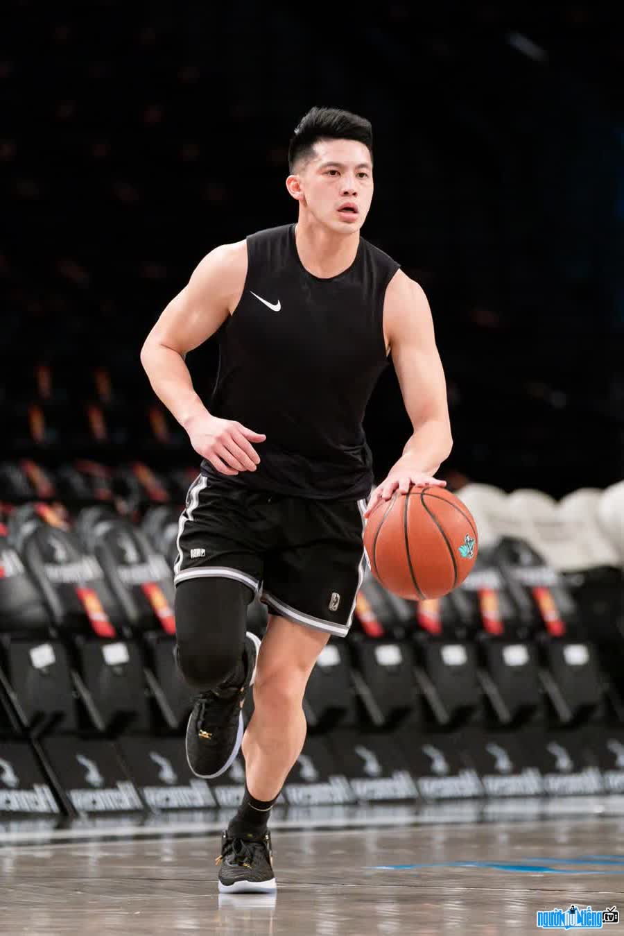 image of handsome Ta Quang Buu on the basketball court