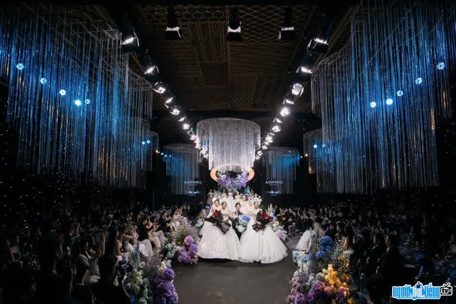 Image of designer Linh Nga during the performance of her wedding dress collection