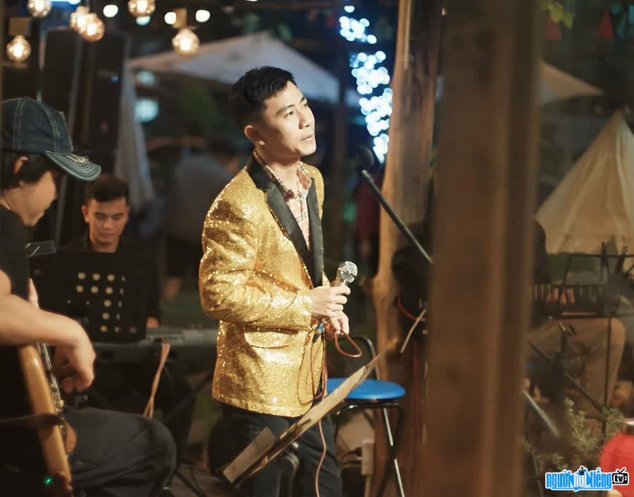 Musician Nguyen Thanh Loc performs on stage