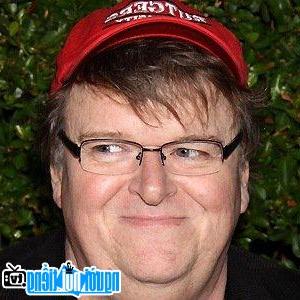 A portrait picture of Director Michael Moore