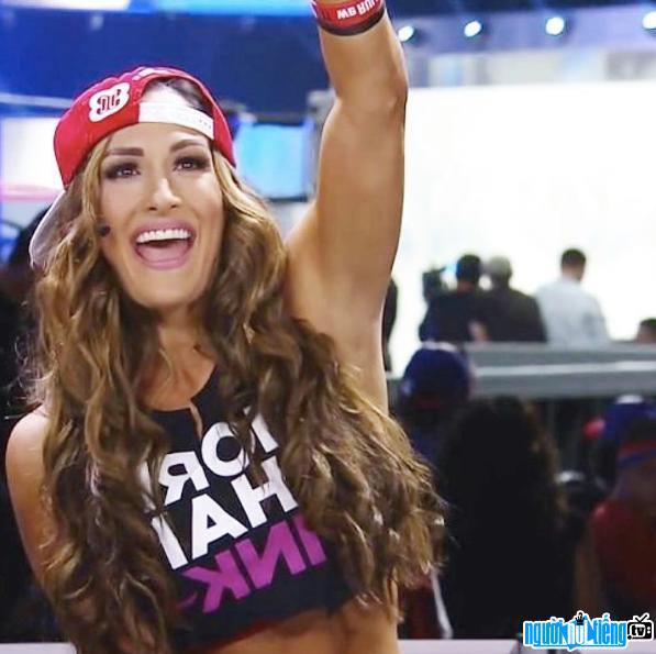 Picture of athlete Nikki Bella celebrating after victory