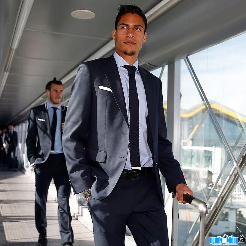 Raphael Varane player image in elegant style with a vest