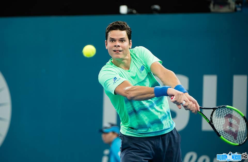 Activity photo Milos Raonic tennis ball while playing