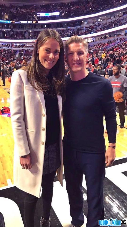 Bastian Schweinsteiger Player Photo with his wife at a stadium