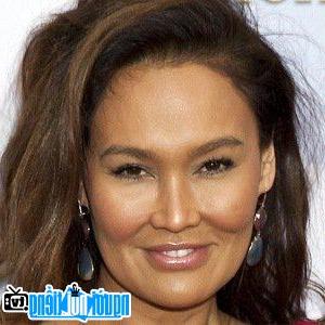 A portrait picture of Actress Tia Carrere