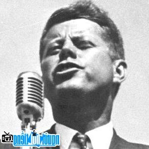 A portrait image of the President US John F. Kennedy