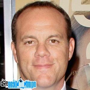 A Portrait Picture Of Comedian Tom Papa