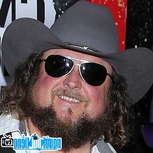 A portrait image of Singer Country music Colt Ford