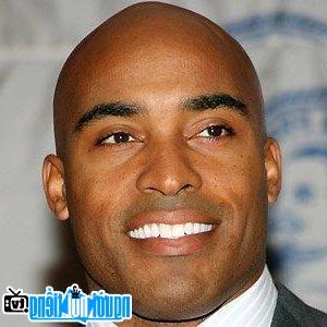 A Portrait Picture of Tiki Barber Soccer Player