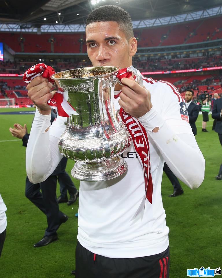 Chris Smalling Soccer Player Holding Championship Cup
