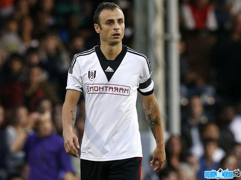 A picture of Dimitar Berbatov football player on the pitch