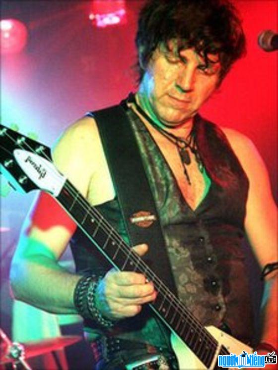 Neil Buchanan's picture performing on stage