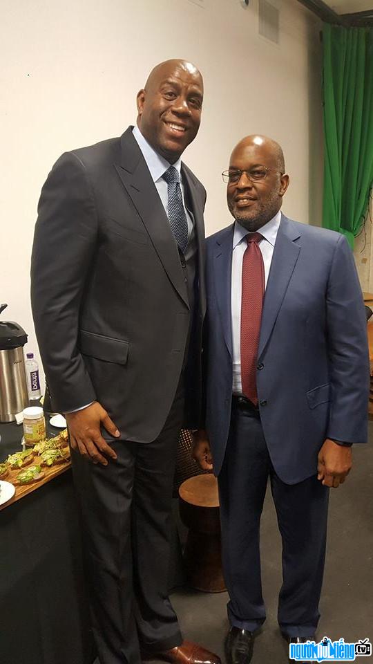 The latest picture of former basketball player Magic Johnson (right)