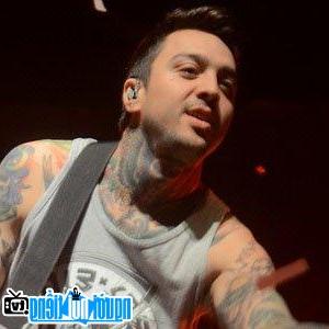 A Portrait Picture Of Guitarist Tony Perry
