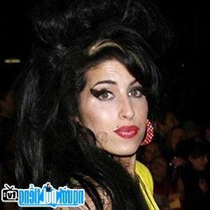 A portrait image of Singer Amy Winehouse's soul music