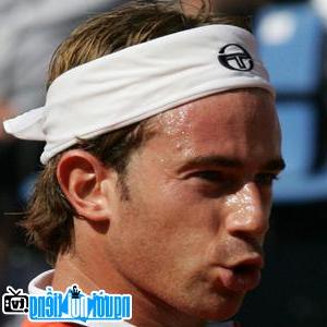 A portrait image of tennis player Filippo Volandri