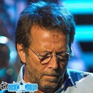 A portrait picture of Guitarist Eric Clapton