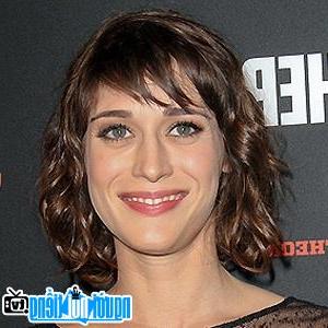 A Portrait Picture Of Actress Lizzy Caplan