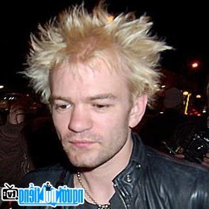 A portrait picture of Guitarist Deryck Whibley