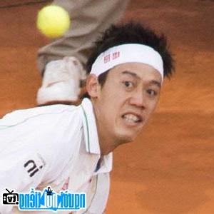 A portrait image of tennis player Kei Nishikori