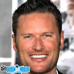 A Portrait Picture Of Musician Brian Tyler
