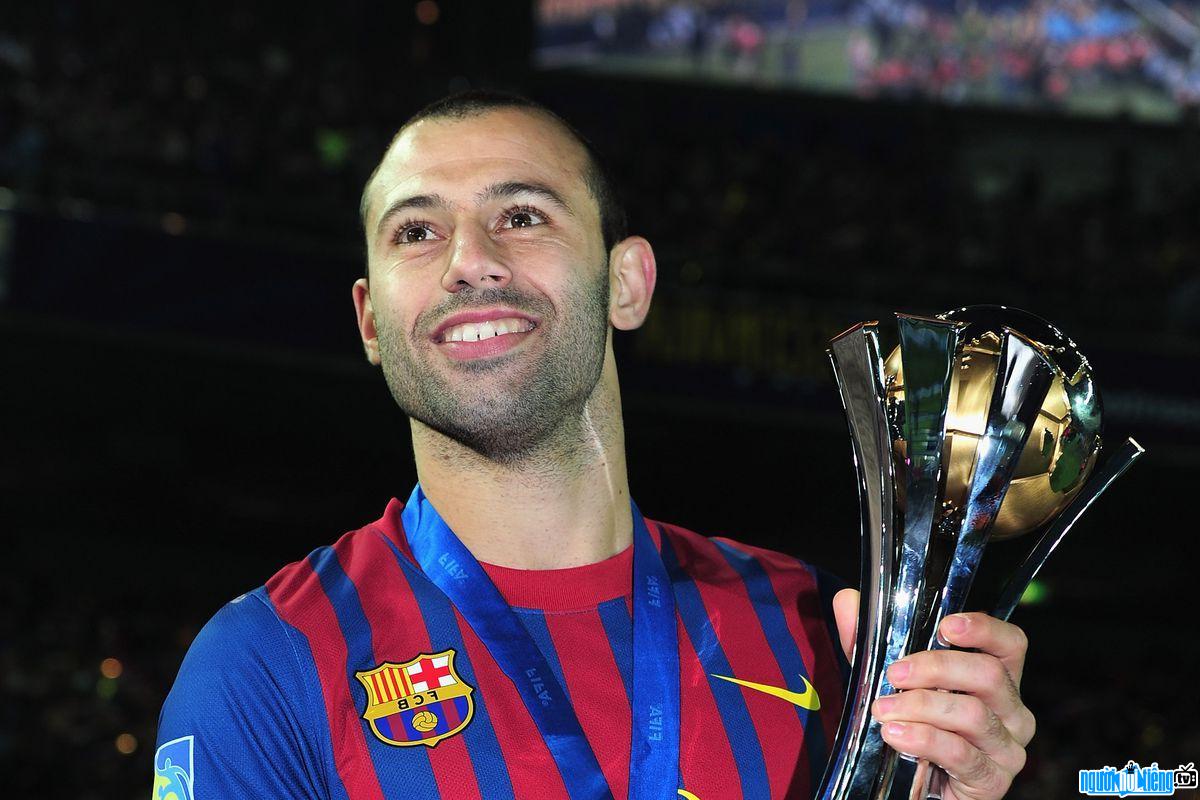 Javier Mascherano Player Picture and the Championship Cup