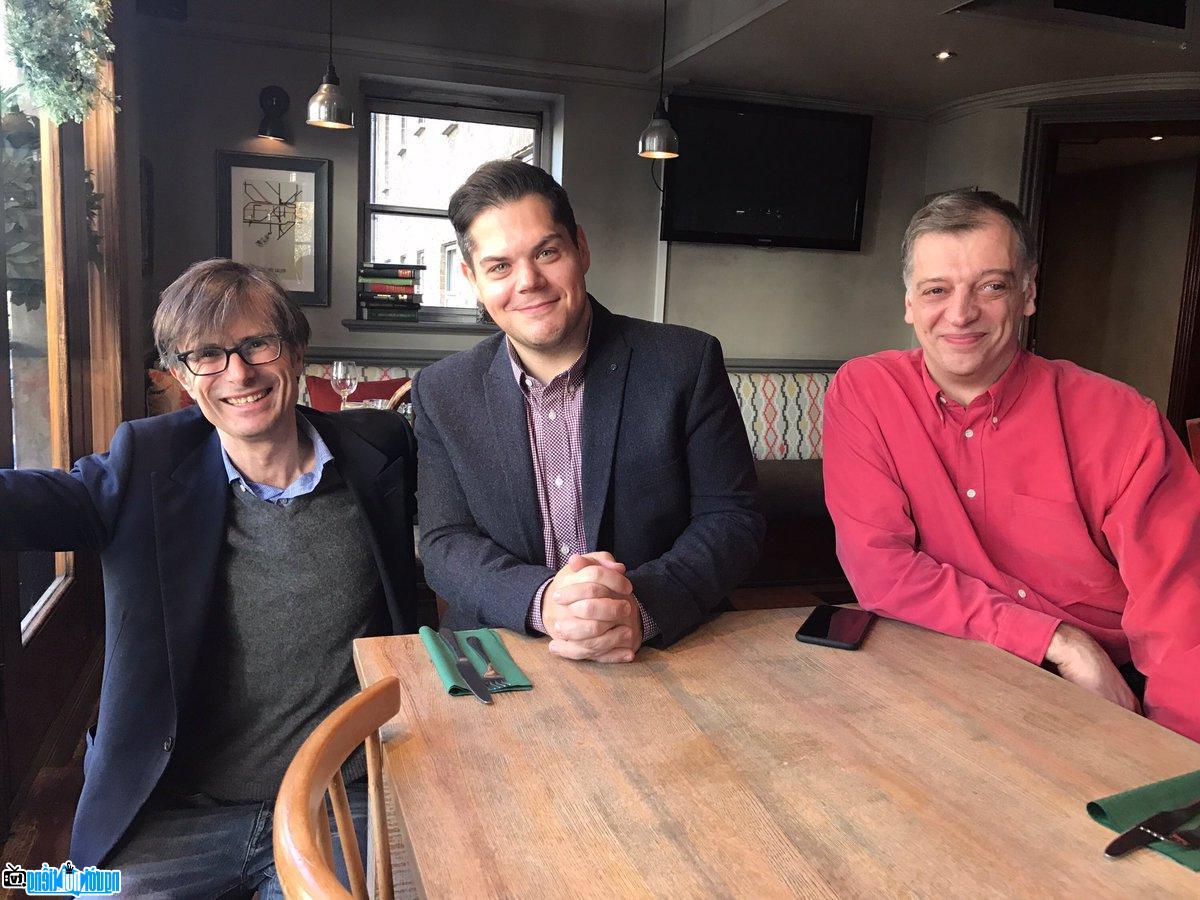 Journalist Robert Peston with his colleagues