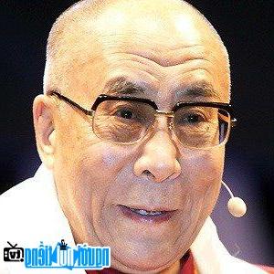 A portrait picture of Dalai Lama Religious Leader 