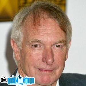A portrait picture of Director Peter Weir