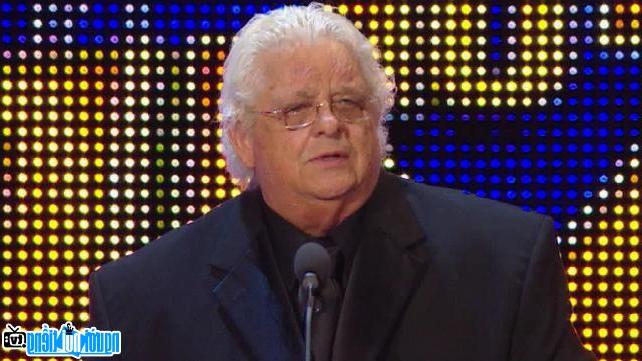 Wrestling athlete Dusty Rhodes photo answering the press