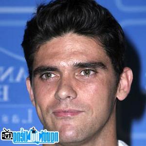 A portrait of tennis player Mark Philippoussis