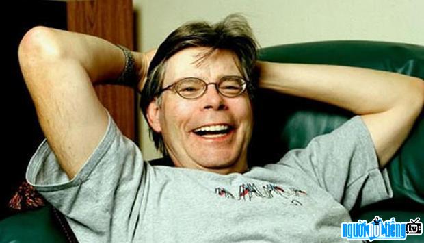 Portrait of Novelist Stephen King and clown statue