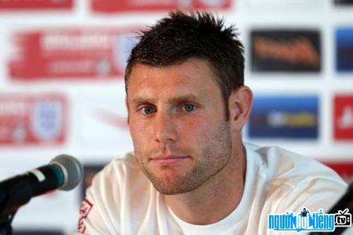 Player James Milner's photo answering the press