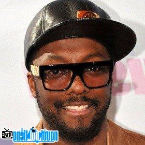 One portrait image of pop singer will.i.am