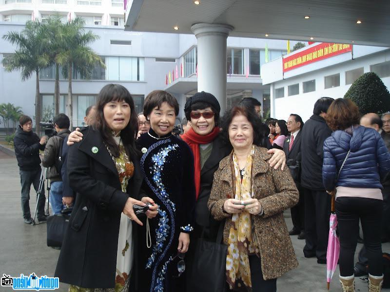 Poet Bui Kim Anh (far left) and friends