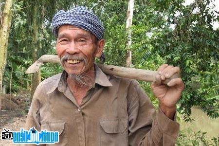  Idyllic image of old farmer - Colonel Nguyen Van Bay