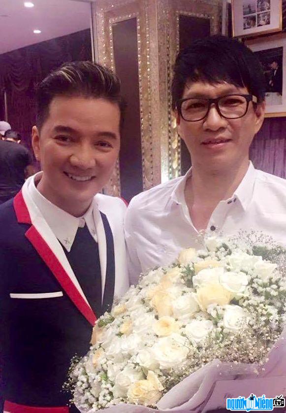 Picture of singer-songwriter Nguyen Minh Anh and singer Dam Vinh Hung