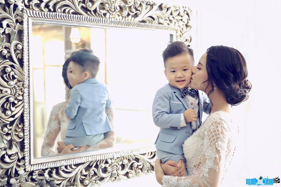 Thu Quynh happily with her son on his recent birthday