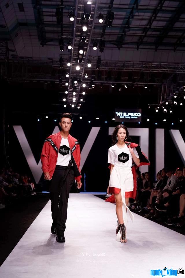 Photo of model Mario Thanh Tam performing on the catwalk